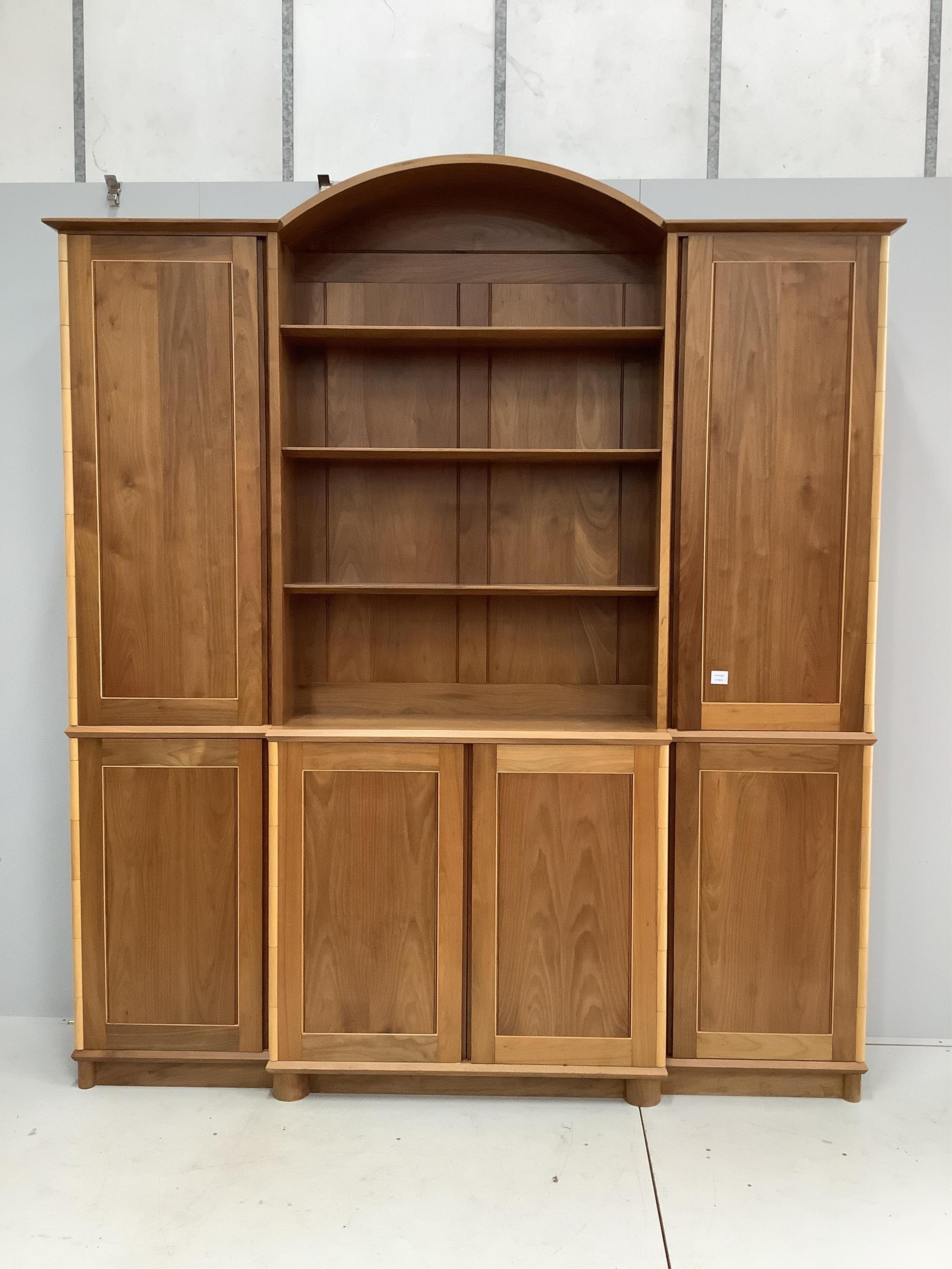 A contemporary walnut breakfront side cabinet, by Charles Thomson of Mayfield, width 204cm, depth 30cm, height 232cm. Condition - good